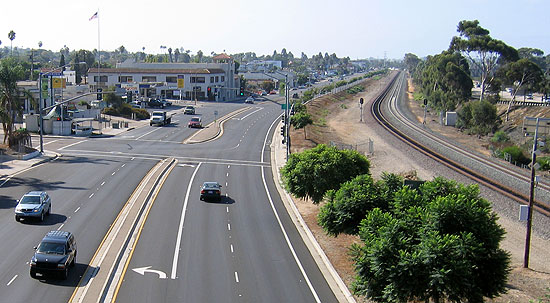 A view from the Clairemont Drive bridge looking south along Morena Boulevard. The proposed Trolley Station will be this side of Ingulf Street, at the light and crosswalk right where the tracks bend, and will be right up close to Morena Boulevard. photo: Kelly Cummings