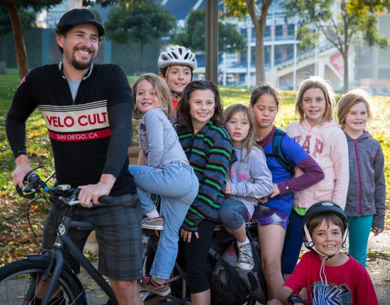 Family of biker dad with kids